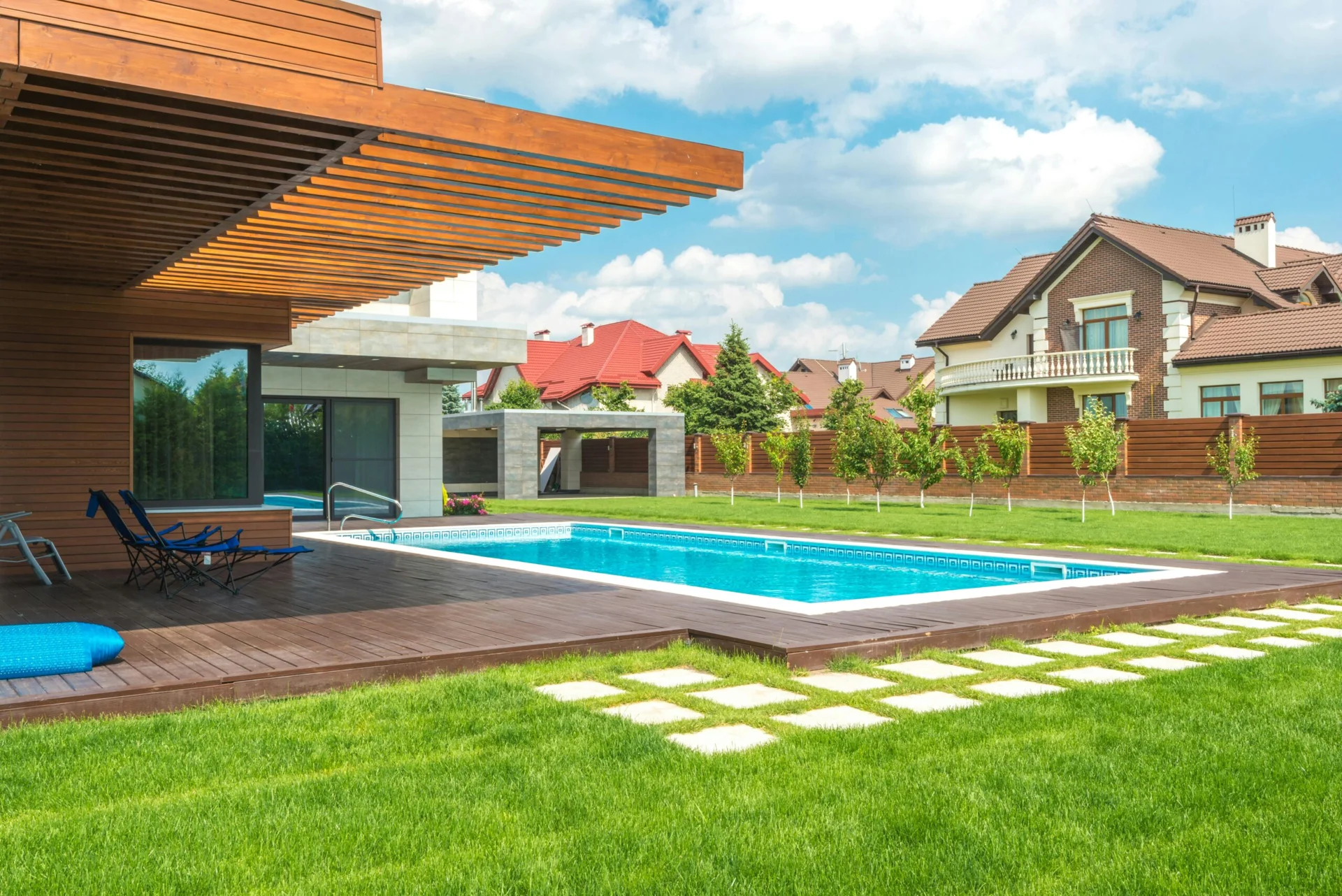 Outdoor living space with timber pergola and pool